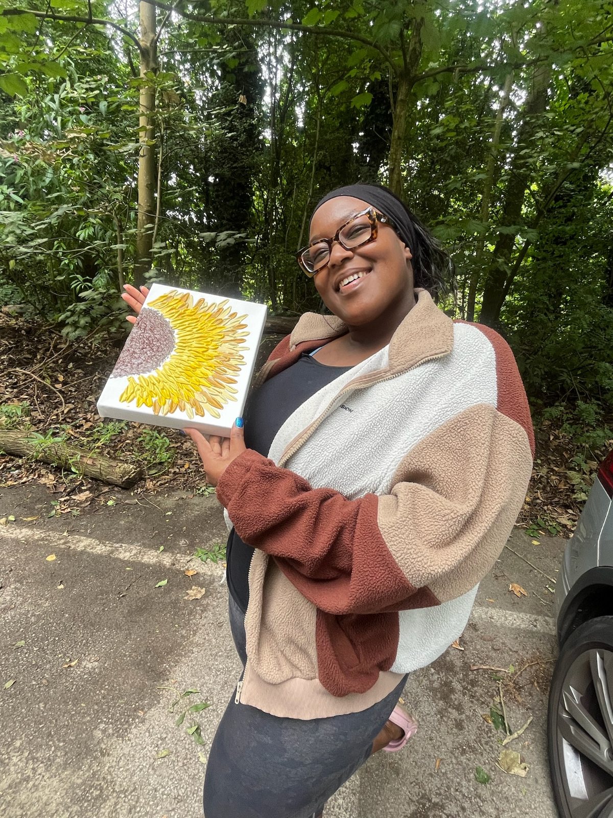 A canvas and paints at a paint and sip night